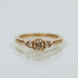 Champagne diamonds tri-stone ring