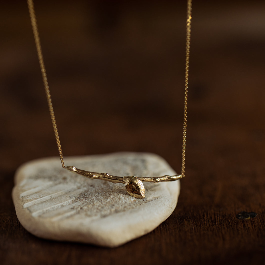 Branch necklace with delicate leaf