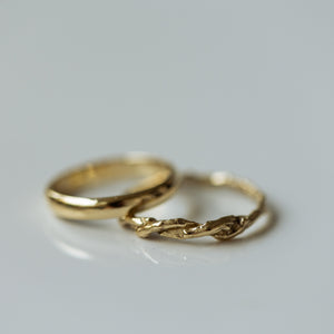 Twisted branch & half round wedding rings