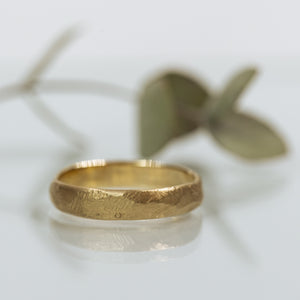 Brushed faaceted gold ring