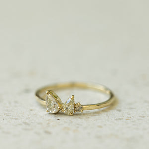 Two drop tri-stone gold ring