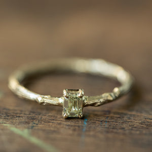 Emerald cut diamond branch ring