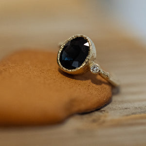 Large oval blue sapphire branch ring
