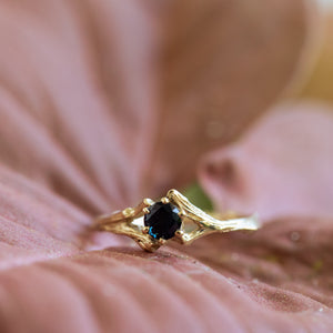Spread branch sapphire engagement ring