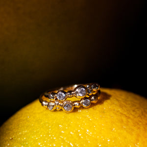 Raw bubbley gold ring with 3 diamond