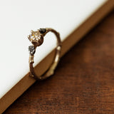 Champagne diamond and meteorites ring
