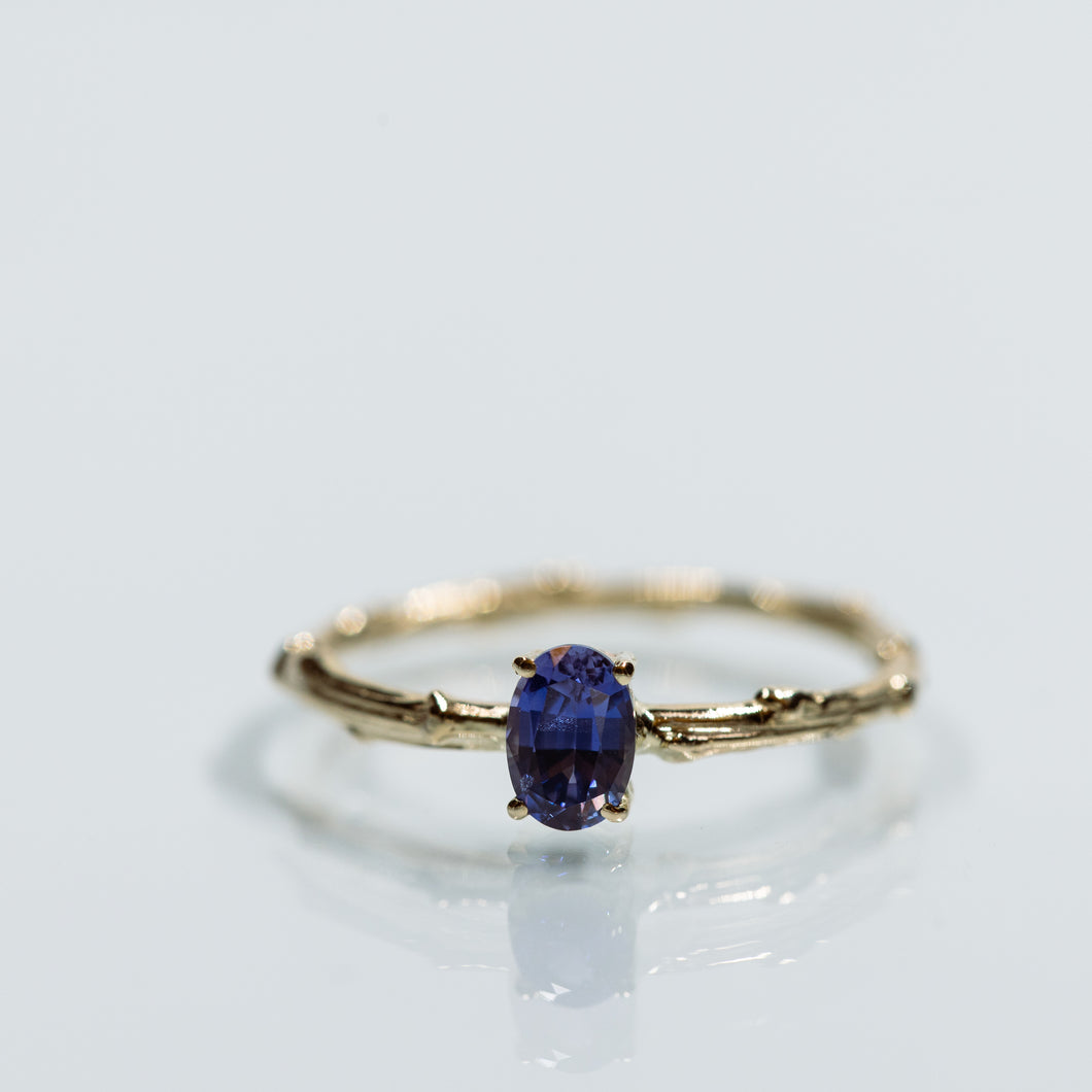 purple oval sapphire branch ring