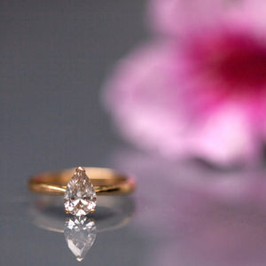 Pear cut solitaire gold ring