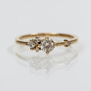 Asymmetrical white diamonds cluster ring