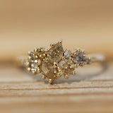 Enormous champagne cluster ring