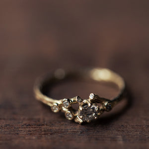 Asymmetrical spreading branch ring champagne diamonds