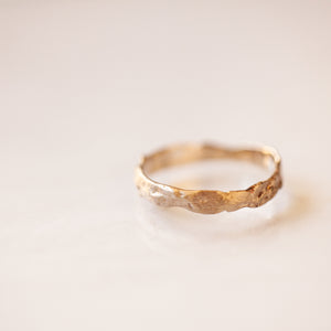Raw weavy edge gold ring
