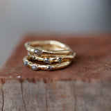 Raw gold ring with 3 rough diamonds