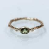 Green sapphire solitaire branch ring