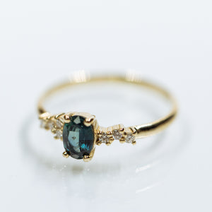 Teal sapphire cluster ring