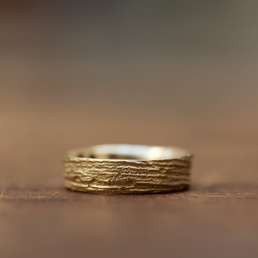 Thin kernel gold ring