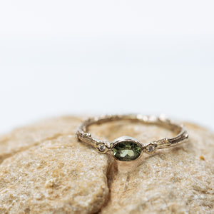 Green sapphire solitaire branch ring