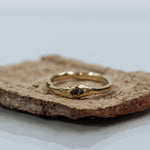 Raw gold ring with rough diamond