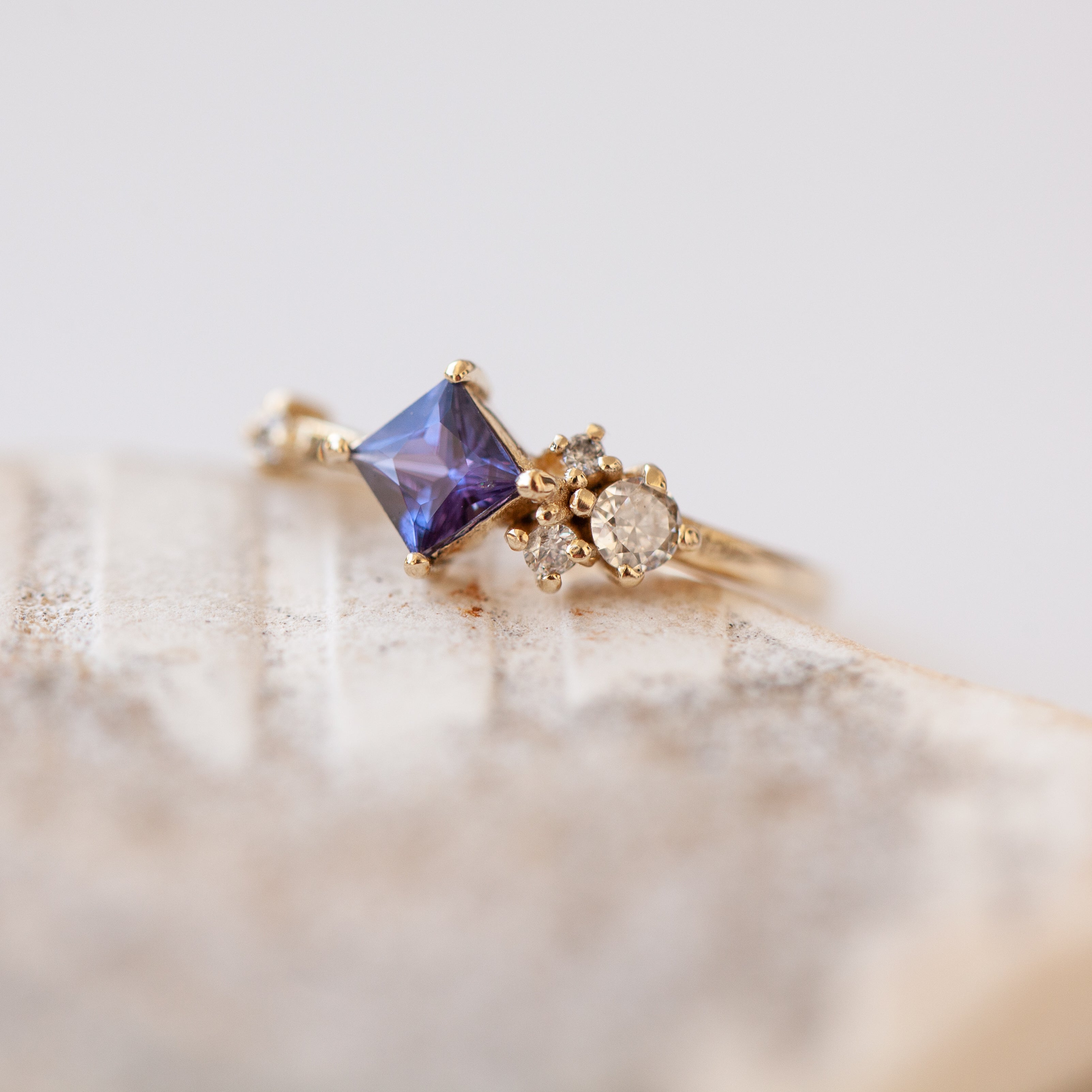 Blue square sapphire cluster ring