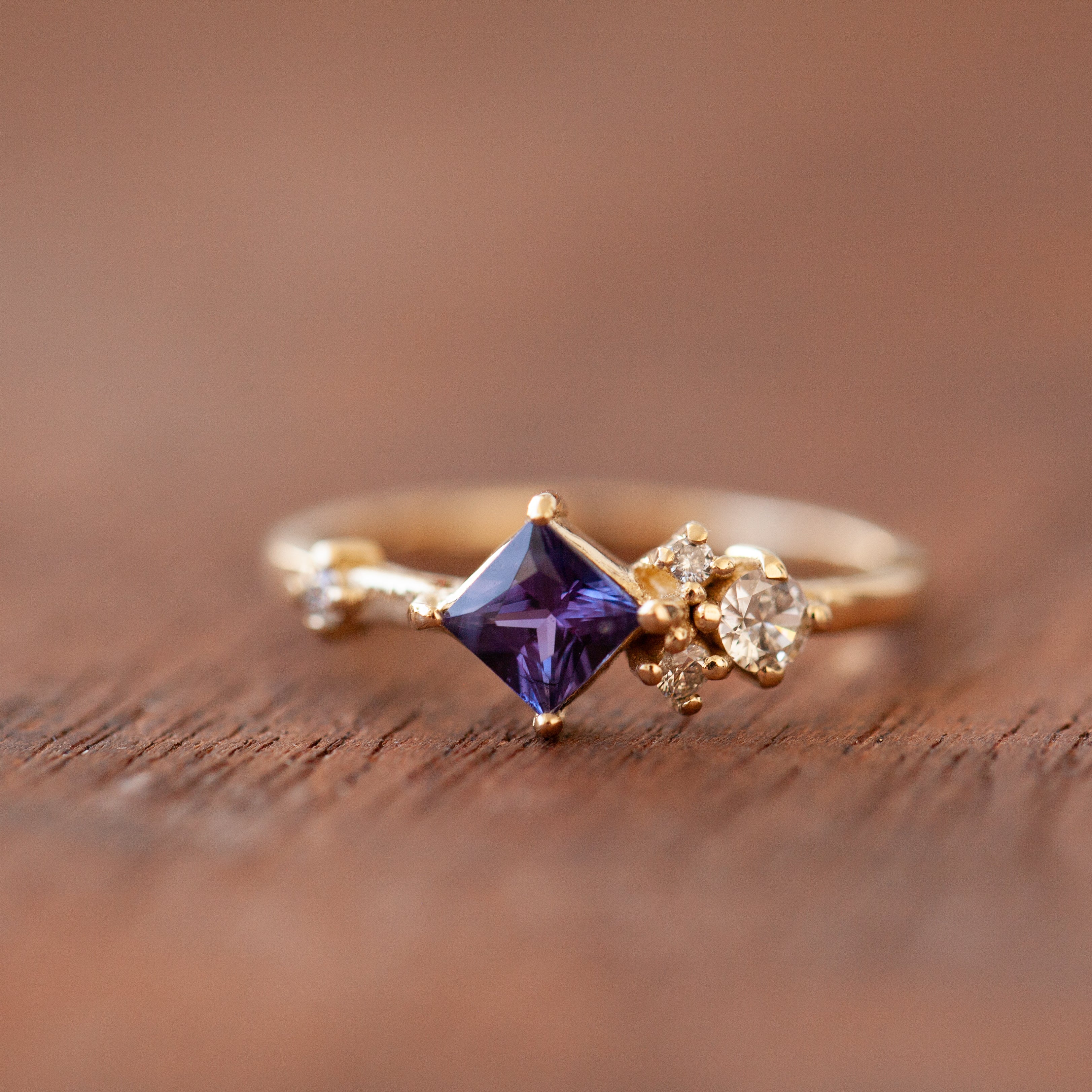 Blue square sapphire cluster ring