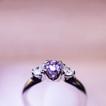 Tri-stone purple sapphire engagement