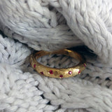 Scattered ruby gold ring