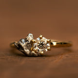 Raw engagement ring with meteorite and diamond