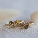 Yellow cluster engagement ring