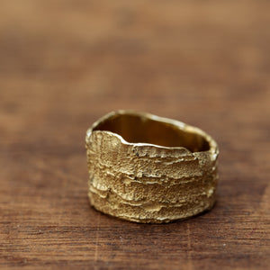 Wide tree bark gold ring