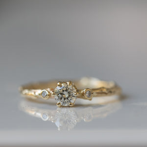 Three- stone branch ring with white diamonds