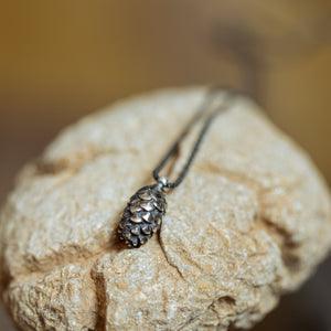 Closed silver pinecone necklace