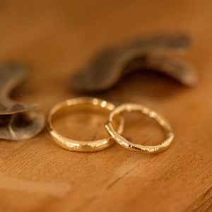 couple of raw wedding rings
