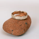 Mountain textured raw wedding ring