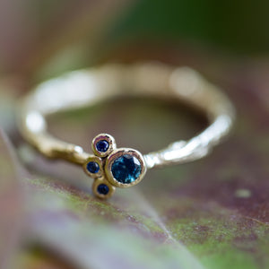 Blue sapphires gentle cluster ring