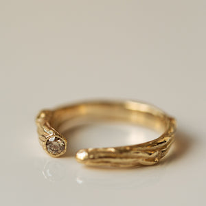Open branch ring with champagne diamond
