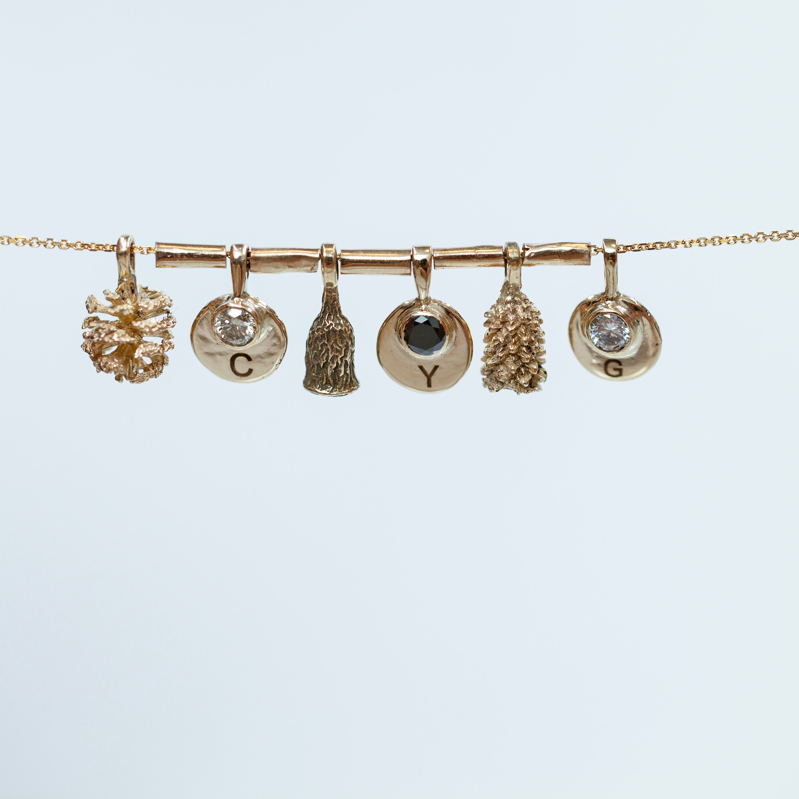 Organic talisman gold necklace