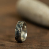Silver Ring with Arranged Stripes and Coal Texture