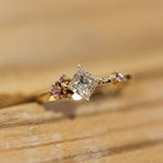 Princess cut diamond and pink sapphires cluster ring