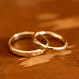 couple of raw wedding rings
