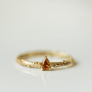 Orange drop diamond on branch ring