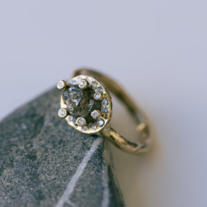 Raw space ring with raw diamonds