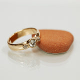 Thick tri-stone diamond ring