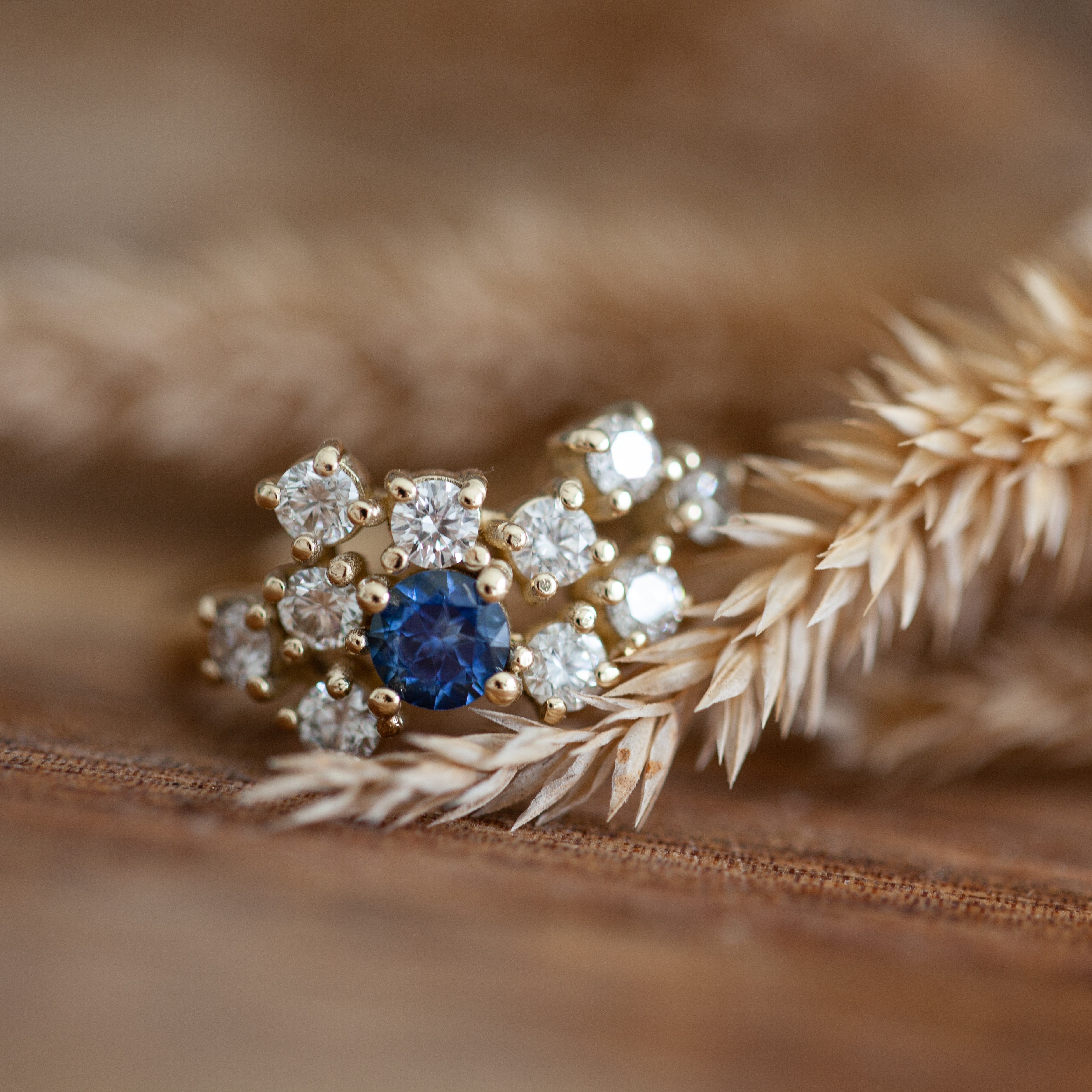 White diamonds & sapphire cluster ring