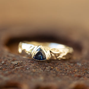 Boulder ring with triangle sapphire