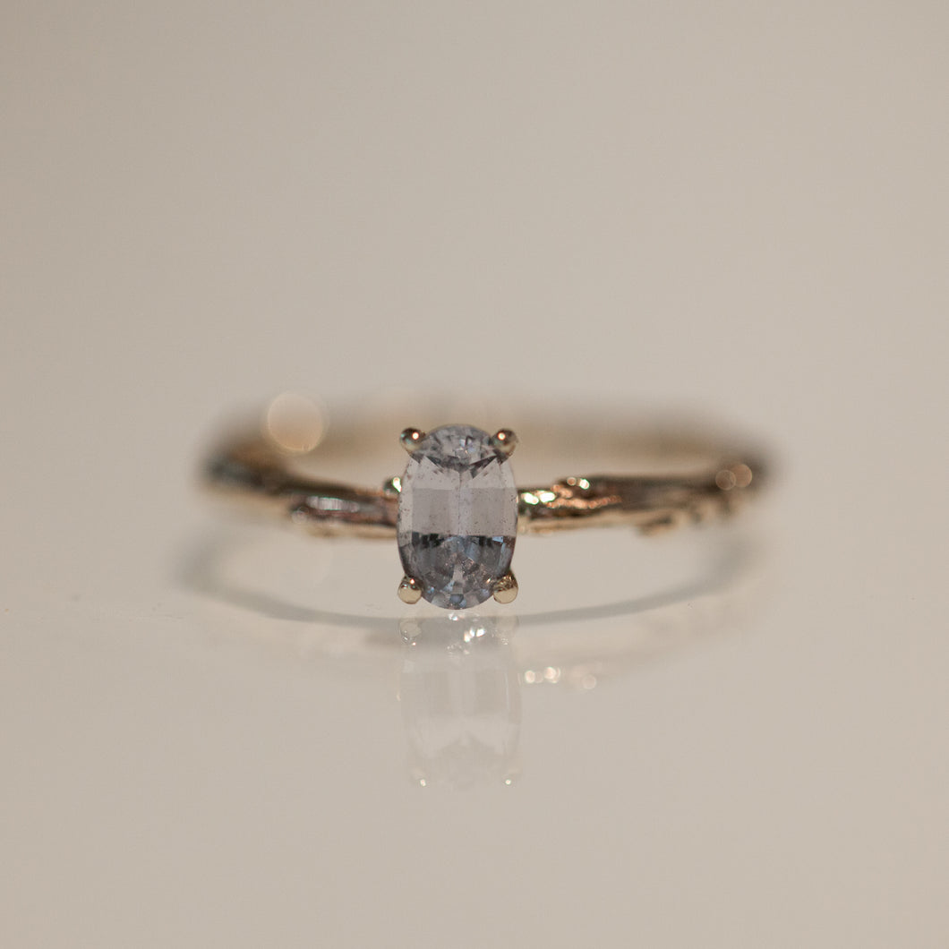 Almost white sapphire branch ring