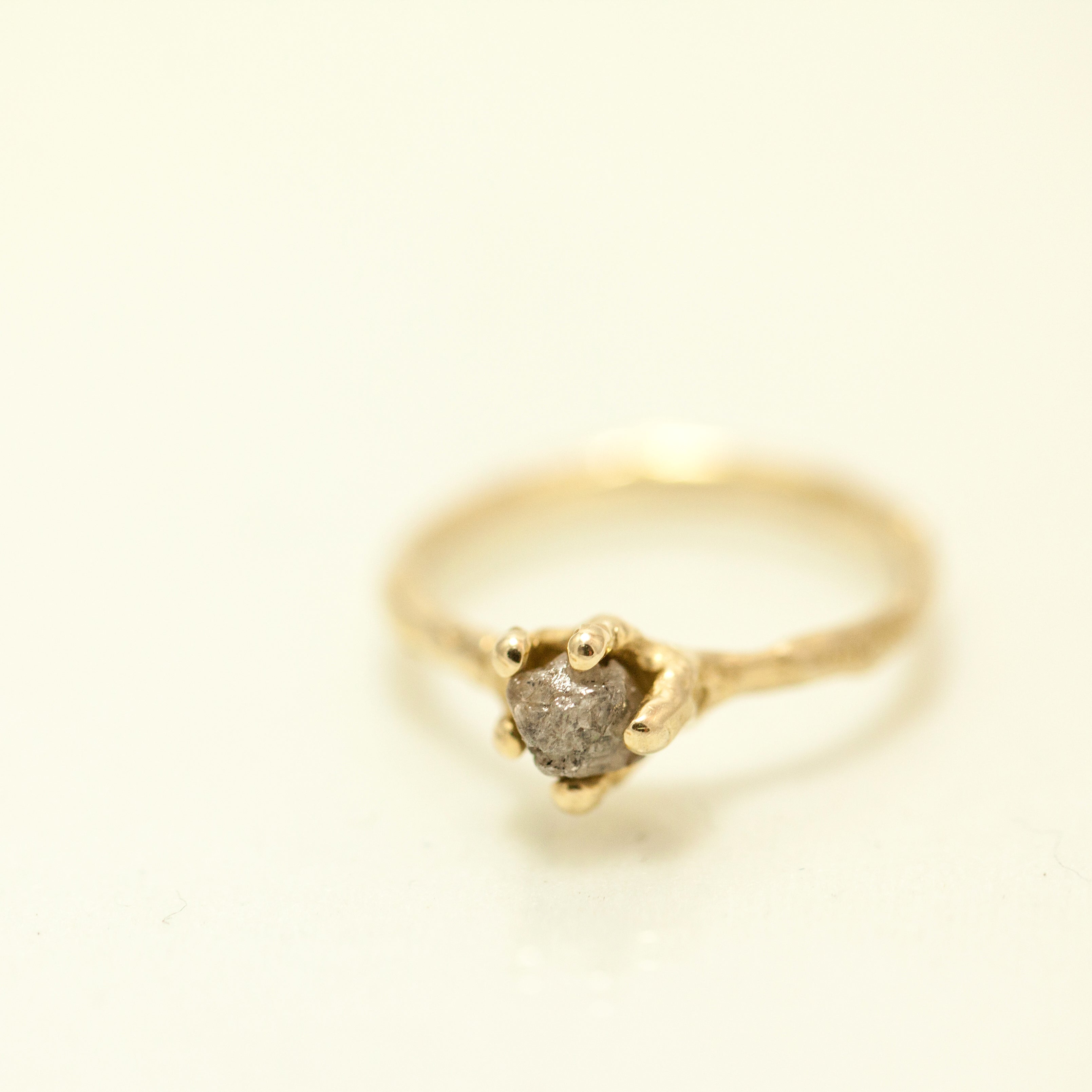 Rough diamond solitaire ring