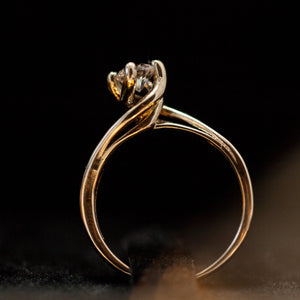 High twist solitaire ring