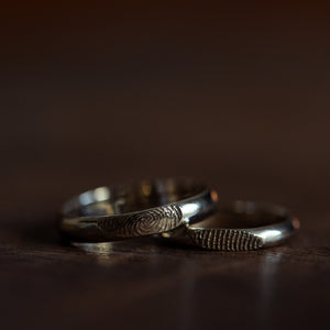 Thin finger print wedding ring