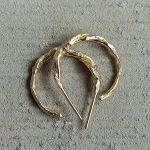 Twisted branch hoop earrings